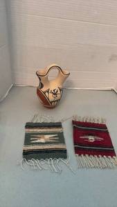 lot 1049 image: Native American Pottery Vessel with Geometric Designs 6.5 inches tall and Two Woven Textile Pieces