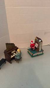 lot 1052 image: 2 Mechanical Music Box Figurines Piano and Santa Organ