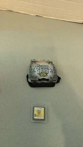 lot 1061 image: Guitar Hero On Tour Nintendo DS Game with Carrying Case and grip controller