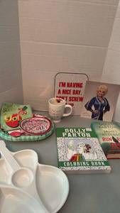 lot 1067 image: Dolly Parton guitar shaped serving tray, coloring book, book and more memorabilia