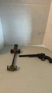 lot 1084 image: Slammer 6-38 Long Barrel Toy Cap Gun and Painted Wooden Pinewood Derby-Style Toy Car
