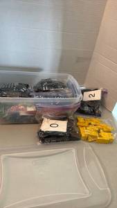 lot 1093 image: Sets of dices with numbered cards in Sterilite container