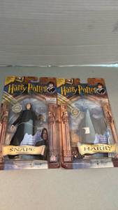 lot 1094 image: Mattel Harry Potter and the Sorcerers Stone Wizard Collection Action Figures Snape and Harry with invisibility cloak