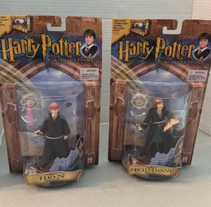 lot 1095 image: Mattel Harry Potter and the Sorcerers  Stone Action Figures, Ron and Hermione