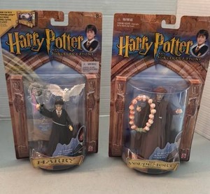 lot 1096 image: Harry Potter and the Sorcerers  Stone Wizard Collection Action Figures Harry and Voldemort