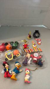 lot 1101 image: Disney figurines, keychains and antenna toppers and more