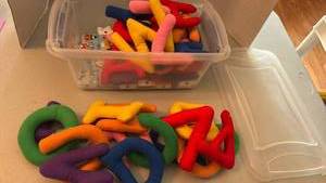 lot 1105 image: Colorful Soft Fabric letters and alphabet blocks with sterilite Storage Container