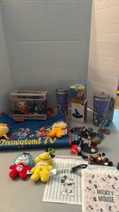 lot 1124 image: Disney Mickey and Friends Disneyland Collectible Lot Funko Pop Figures, Travel Mugs and more