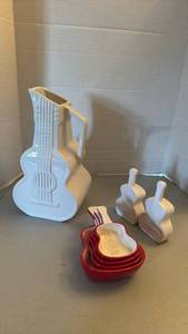 lot 1209 image: Guitar-Shaped Ceramic Measuring Cups, pitcher and salt and pepper shakers