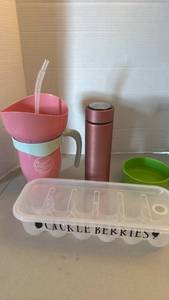 lot 1214 image: Mixed Drinkware & Storage Lot Snack Time Cup, Teabloom Bottle, Egg Container, Green Bowl