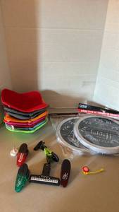 lot 1229 image: Shila Bowl Snuggies, burner covers and magnets