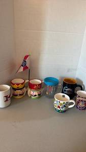 lot 1244 image: Novelty Mug Collection including Brighton, Hogwarts and more