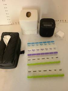 lot 1447 image: Ceramic tissue box holder, ultrasonic cleaner, pill boxes, and Dopp kit style tissue dispenser
