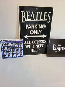 lot 1465 image: Beatles tin sign and CDs.