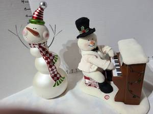lot 3015 image: Piano playing snowman, needs batteries, ceramic snowman, 13 inches tall.