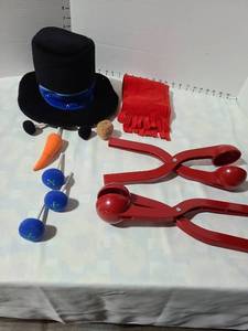 lot 3023 image: Snowman hat, scarf, eyes, carrot nose, corncob pipe, buttons, all contained inside zippered hat,  plus 2 Sno-Ballers