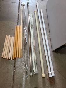 lot 3040 image: Curtain and extension rods and dowels.