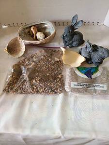 lot 3065 image: Seashells, resin bunnies, gravel.