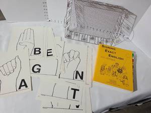 lot 3204 image: Signing Exact English Educational Materials with Flash Cards and decorative metal basket
