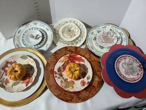 lot 3212 image: Homemade yard decor using plates, candle holders, more. Must provide your own stakes.