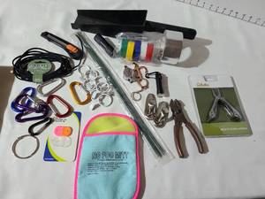 lot 3233 image: Cabelas multi tool knife, gutter scoop, carabiners, more.