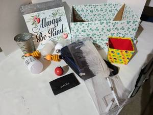 lot 3238 image: Wall sign, light bulbs, Eddie Bauer wallet, more.