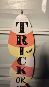 lot 3359 image: Trick or Treat Halloween Candy Corn Shaped Sign - 57.5x9