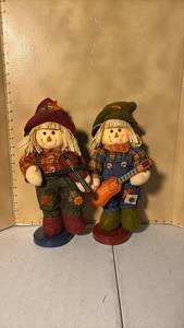 lot 3362 image: Pair of Scarecrow Decorations with Violin and Guitar Instruments