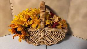 lot 3375 image: Woven Basket with Artificial Fall Flowers