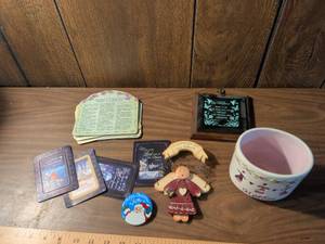 lot 35 image: Decorative Items Lot - Ceramic Mug, Plaques, Coasters, Doll, and Printed Cards