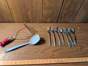 lot 57 image: Flatware Lot 6 Forks 2 Spoons 1 Spatula 1 Fork with Red Handle