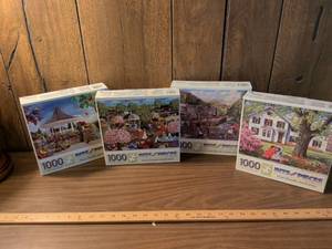 lot 63 image: Bits and Pieces 1000 Piece Jigsaw Puzzles Lot of 4