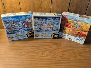 lot 68 image: Lot of 3 Master Pieces Holiday Signature Collection 1000 Piece Jigsaw Puzzles