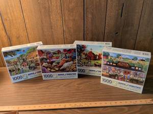 lot 73 image: Bits and Pieces 1000 Piece Jigsaw Puzzles Lot of 4