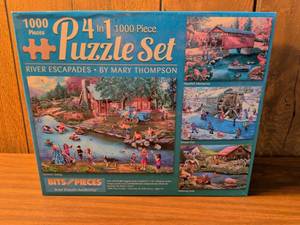 lot 77 image: Bits and Pieces 4 in 1 River Escapades 1000 Piece Puzzle Set by Mary Thompson