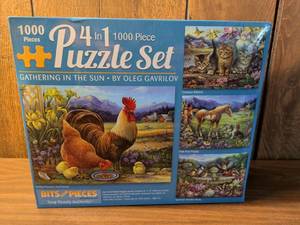 lot 78 image: Bits and Pieces 4 In 1 1000 Piece Puzzle Set Gathering in the Sun by Oleg Gavrilov