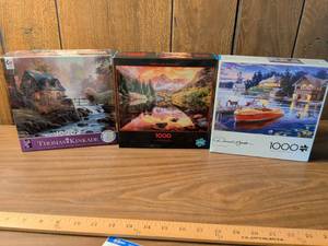 lot 89 image: Lot of 3 Jigsaw Puzzles 1000 Piece Thomas Kinkade Buffalo