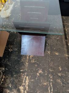 lot 177 image: Glass Top Dining End Table with X-Frame Base approximately 24 in. By 24. And 23 in tall