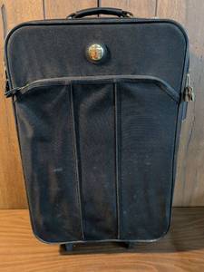lot 228 image: American Tourister Rolling Luggage Carry-On Suitcase