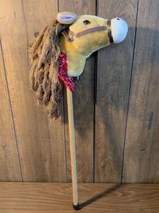 lot 231 image: Hobby Horse with Brown Mane Red Bandana and Halter