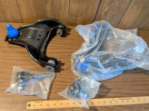 lot 233 image: Control Arm with Ball Joint and Tie Rod End Suspension Parts Lot