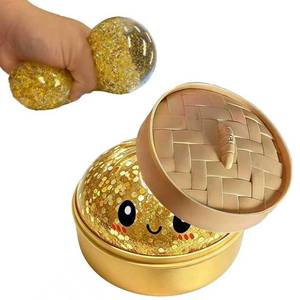 lot 5457 image: Mystery Dumpling Squishies Box,Stress Relief Fidget for Adults & Teens Stocking Stuffers Gift Soft Squeeze Stress Balls.(Gold Glitter)