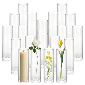 lot 38362 image: 20 Pack Small 5.9 Tall x 1.8 Diameter Clear Glass Cylinder Vases - Multi-Use Flower Vase, Hurricane & Floating Candle Holders for Wedding Centerpieces, Home Decor, Table Displays (20) - Retail $37