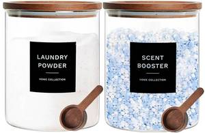 lot 38364 image: Glass Laundry Storage Containers with Acacia Lids and Scoops, 2 Pack Laundry Room Organization Jars with Labels, Powder Detergent Organizer and Laundry Pod Holder, Glass Laundry Beads Canisters Set - Retail $37