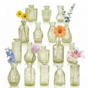 lot 38390 image: Glass Bud Vases in Bulk Set of 17, Green Small Mini Vases for Flowers, Vintage Vase for Centepiece,Wedding, Table Decor, Baby Shower, Christmas, Home and Events - Retail $28