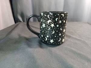 lot 60196 image: Black Ceramic Mug with Moon and Star Pattern