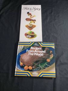 lot 60296 image: 2 Cookbooks Hot & Spicy Foods by Louise Stele, Recipes From Around The World by Jules Bond