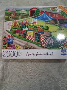 lot 10 image: Nancy Wernersbach Festival Day 2000 Piece Jigsaw Puzzle by MB Puzzles