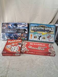 lot 12 image: Board Game Lot - Battleship Wakanda Forever, Wichita-Opoly, Yahtzee & Scrabble