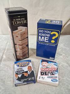 lot 13 image: Family Game Night Bundle �� Jumbling Tower, Do You Know Me, Family Feud & Monopoly Deal